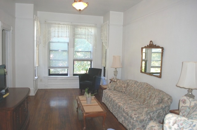 3414 North Seminary Avenue Chicago, IL 60657 - Photo 9 of 14 a living room with furniture and a window