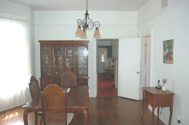 3414 North Seminary Avenue Chicago, IL 60657 - Photo 10 of 14 a view of a livingroom with a chandelier