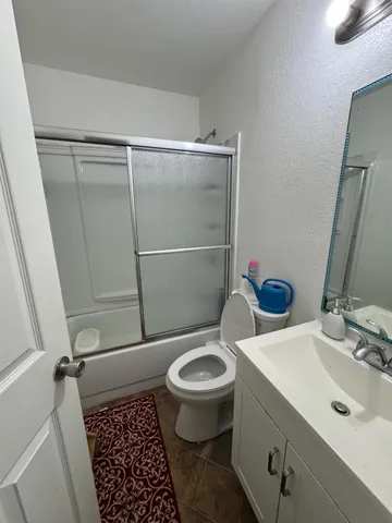 a bathroom with a sink and a toilet