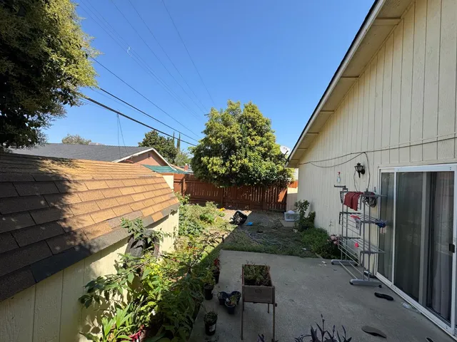 a backyard of a house with lots of green space
