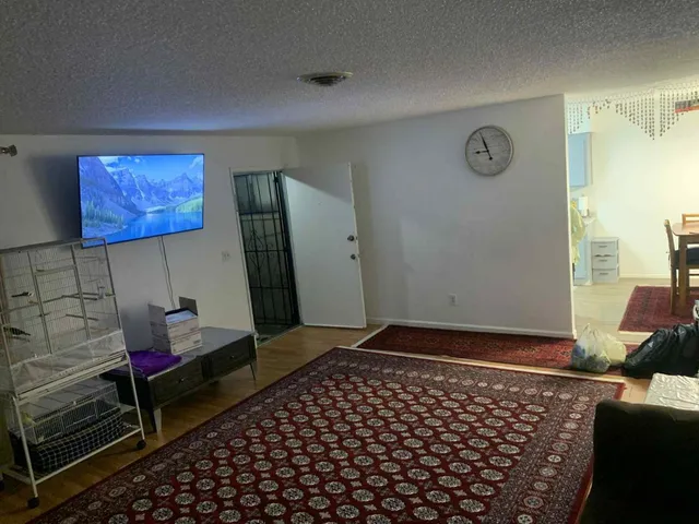 a room with furniture and a window