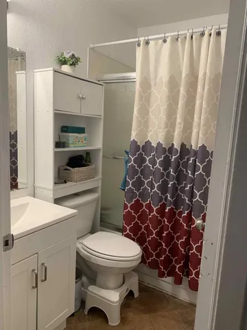 a bathroom with a sink and a toilet