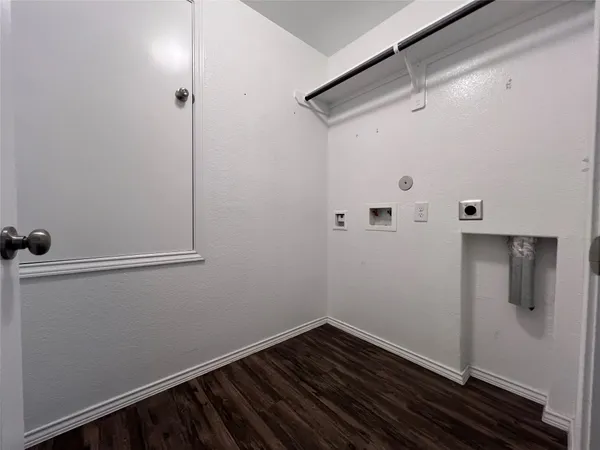 a view of small space with racks on the wall
