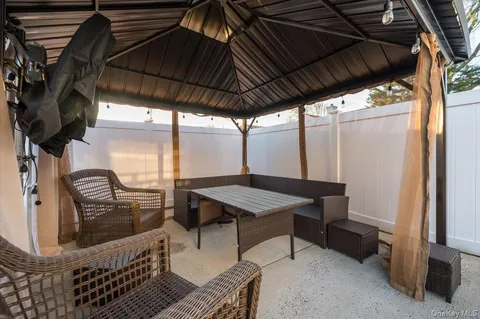 a view of an outdoor space with seating area