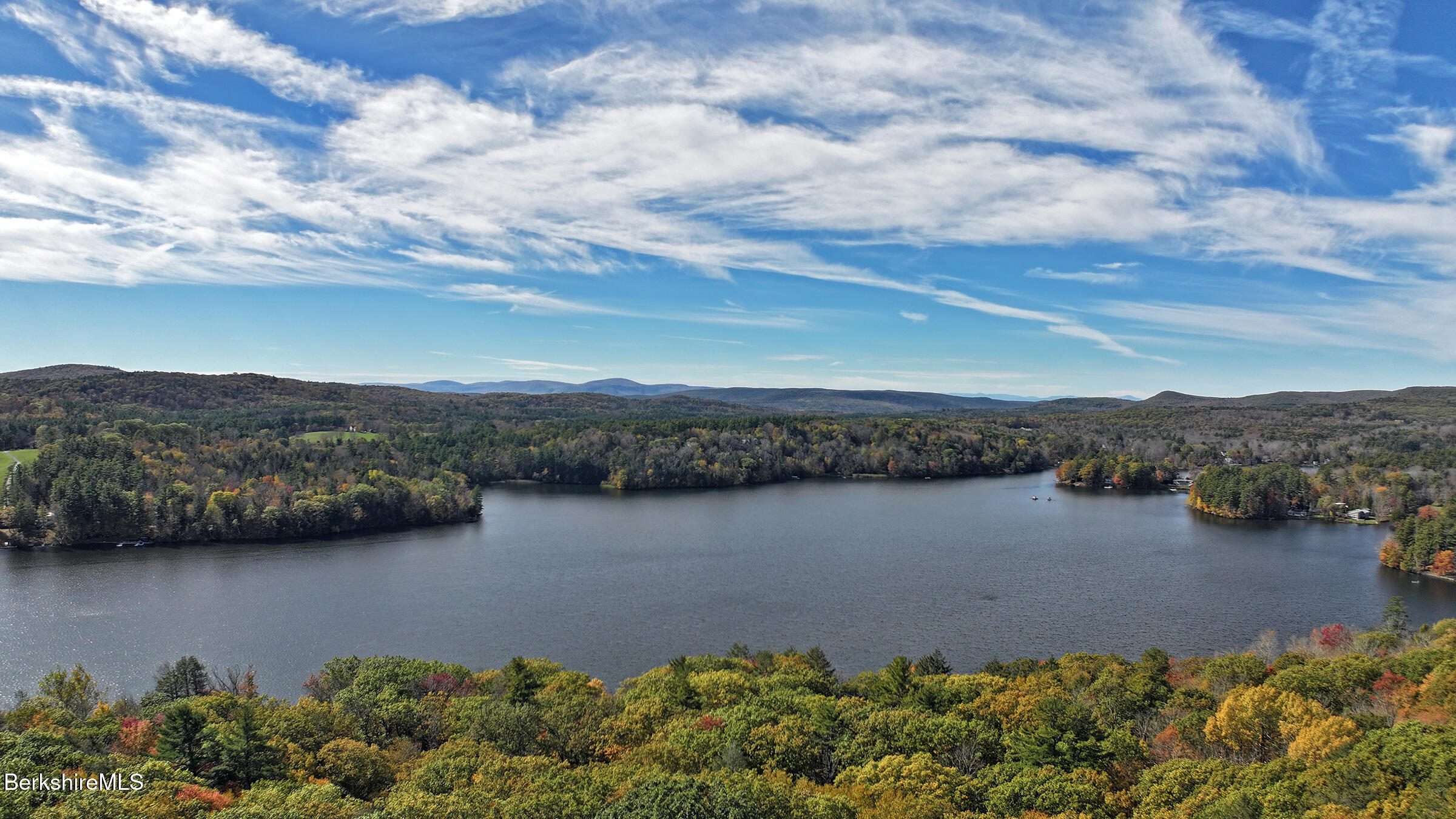 Lot#104 Hupi Road Monterey, MA 01245 - Photo 8 of 10 a view of a lake with a mountain in the background