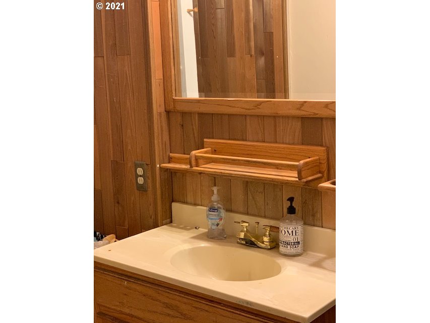 37811 Upper Camp Creek Road Springfield, OR 97478 - Photo 20 of 30 a bathroom with a sink and a mirror