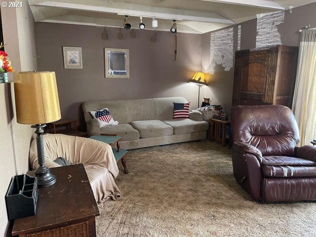 37811 Upper Camp Creek Road Springfield, OR 97478 - Photo 7 of 30 a living room with furniture and a lamp