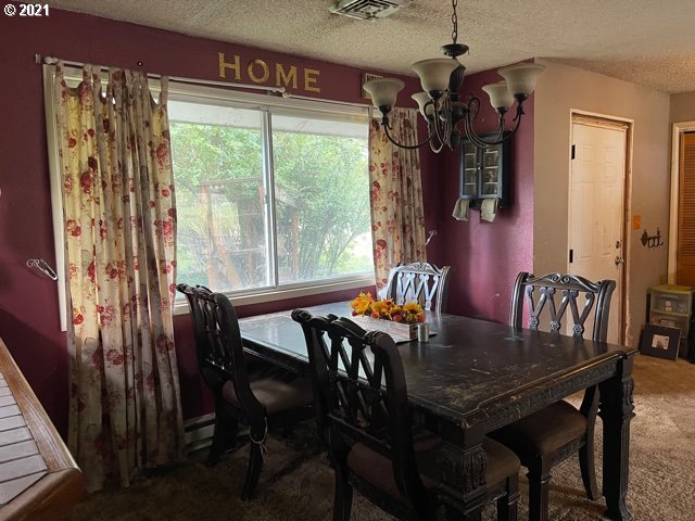 37811 Upper Camp Creek Road Springfield, OR 97478 - Photo 8 of 30 a view of a dining room with furniture window and outside view