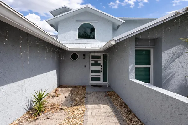 a front view of a house with a space