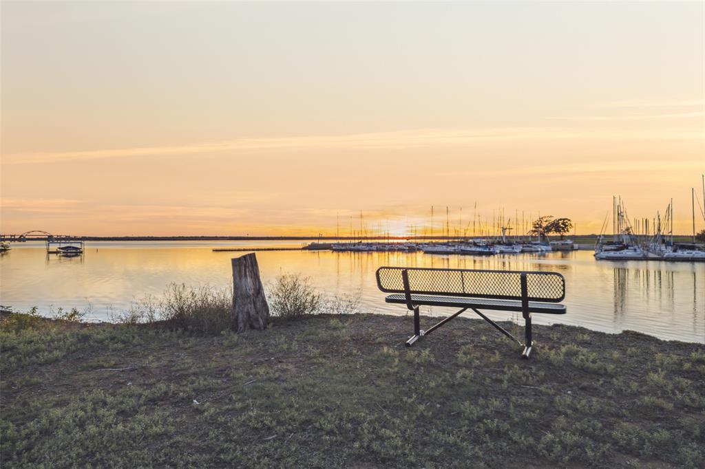 350 West Dickson Lane Oak Point, TX 75068 - Photo 18 of 23 a view of a lake with outdoor space