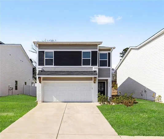 a front view of house with yard