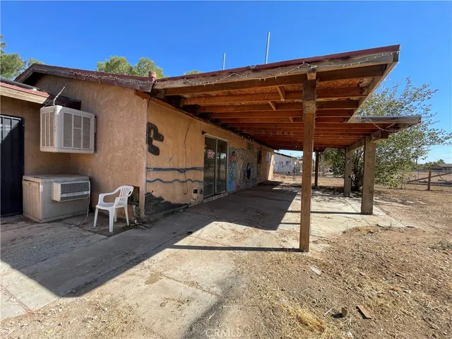 a view of a backyard of a house