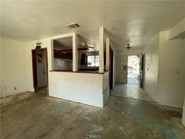 a view of a kitchen with a sink