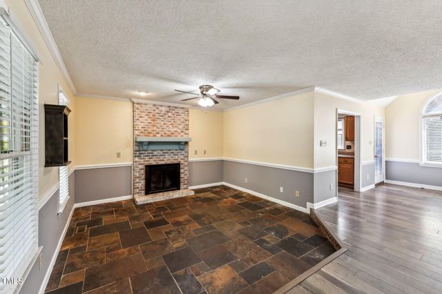 a view of a livingroom with a fireplace