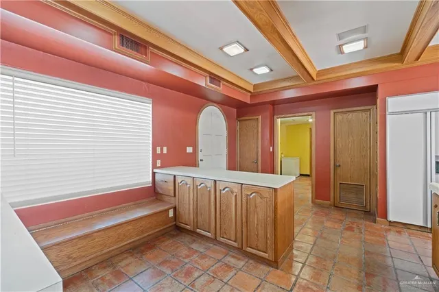 a view of a hallway with seating area