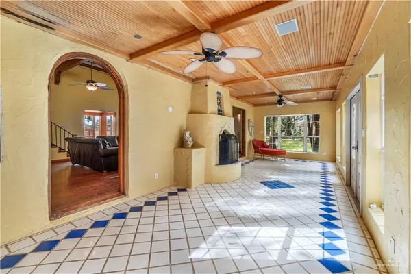 a view of a hallway view with living space with furniture