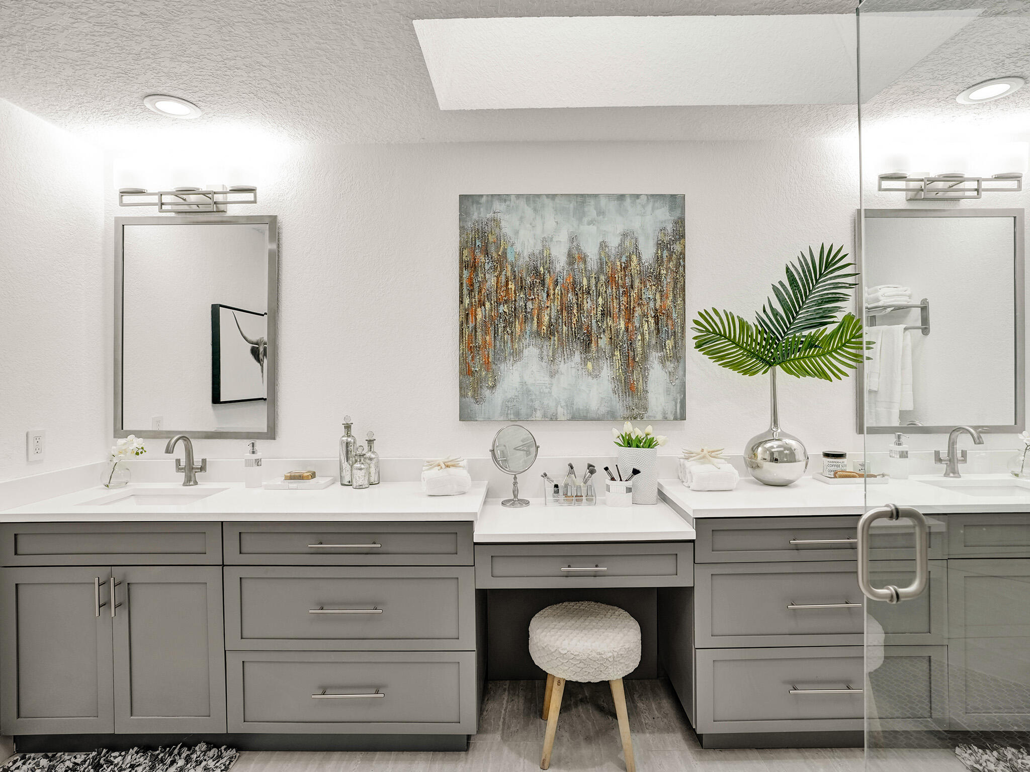 10698 Crystal Lake Drive Boca Raton, FL 33428 - Photo 22 of 48 a bathroom with a double vanity sink mirror and