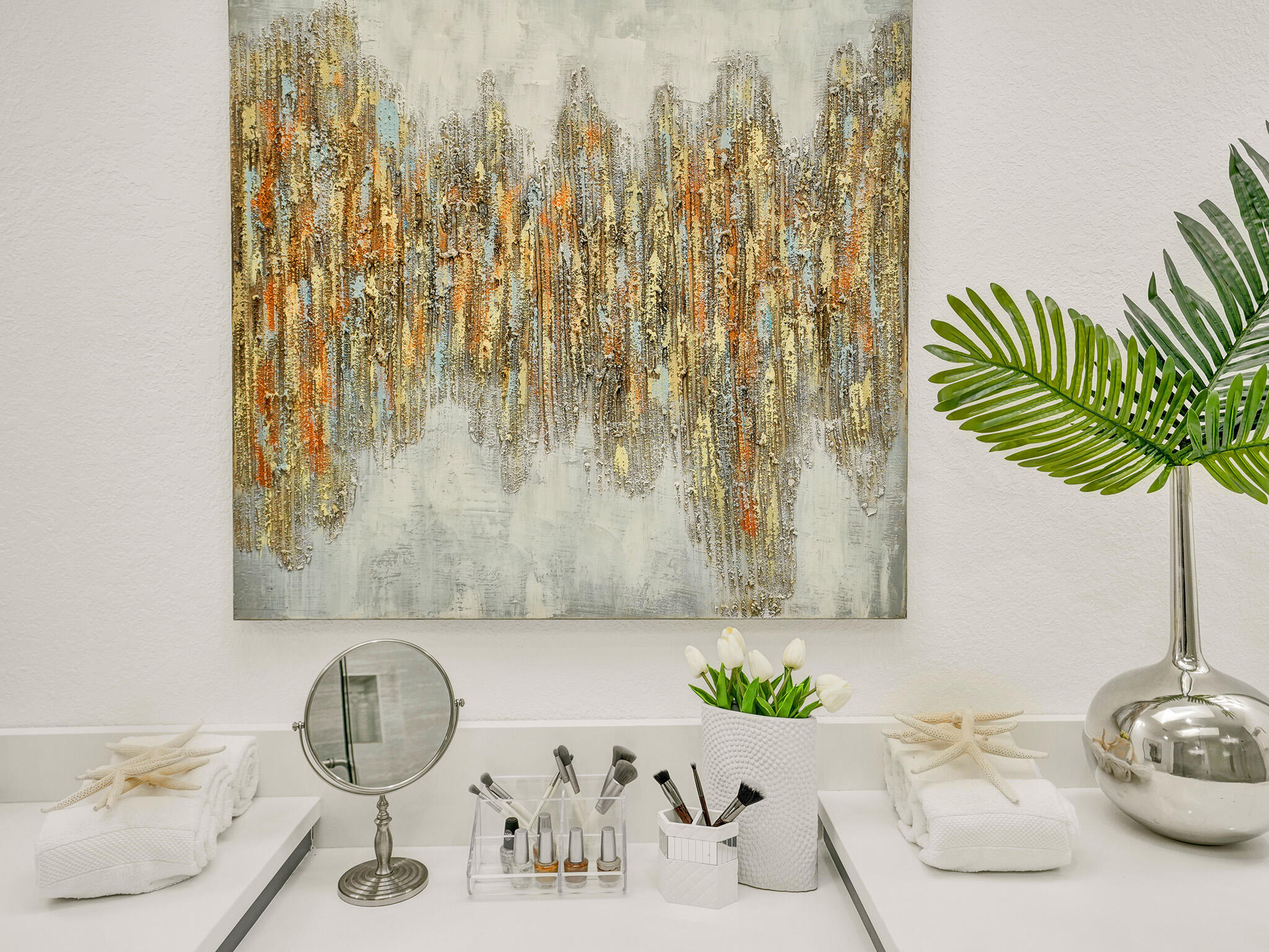 10698 Crystal Lake Drive Boca Raton, FL 33428 - Photo 24 of 48 a vase of flowers sitting on a table with wooden floor