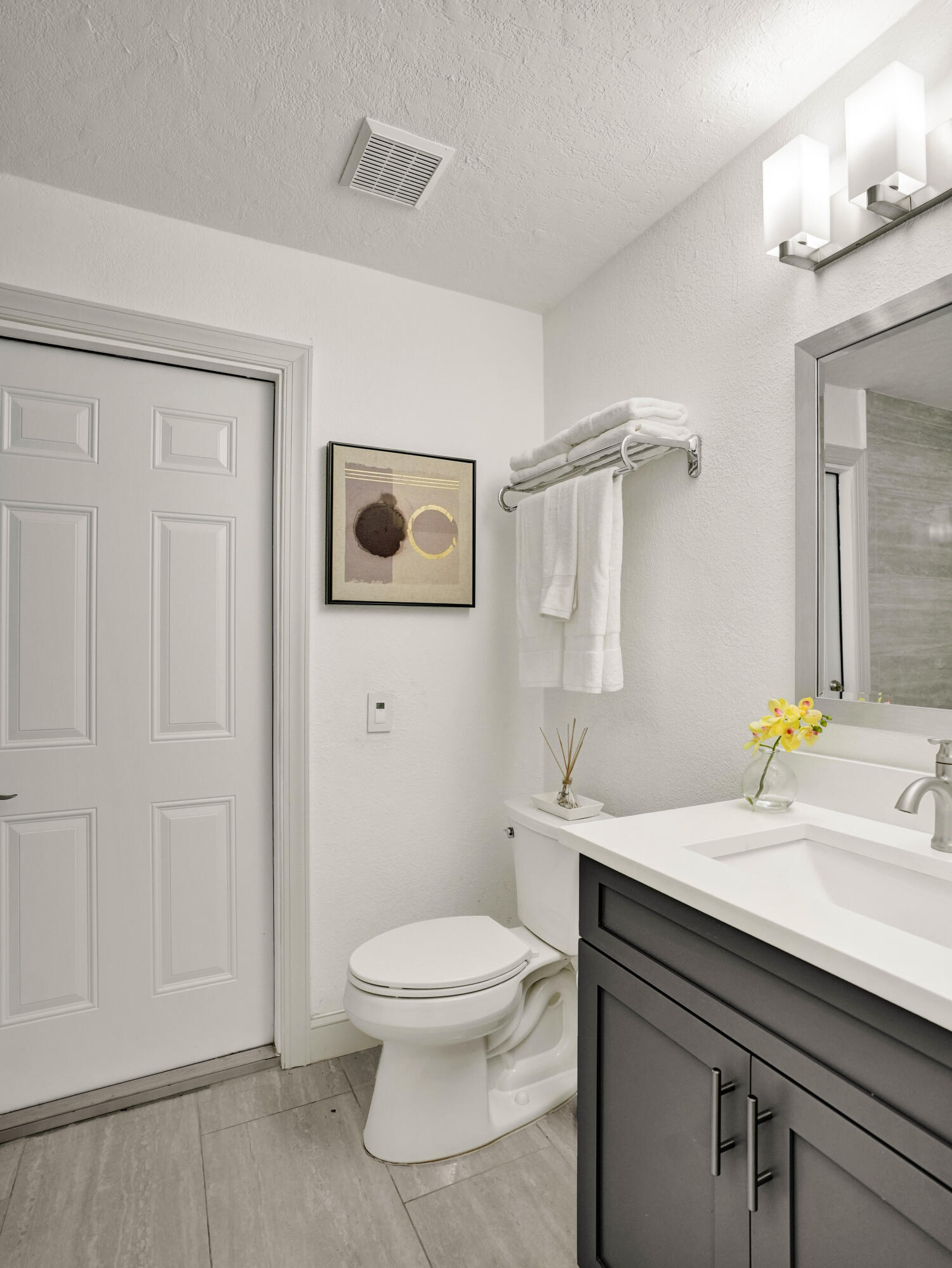 10698 Crystal Lake Drive Boca Raton, FL 33428 - Photo 32 of 48 a bathroom with a sink a toilet and shower