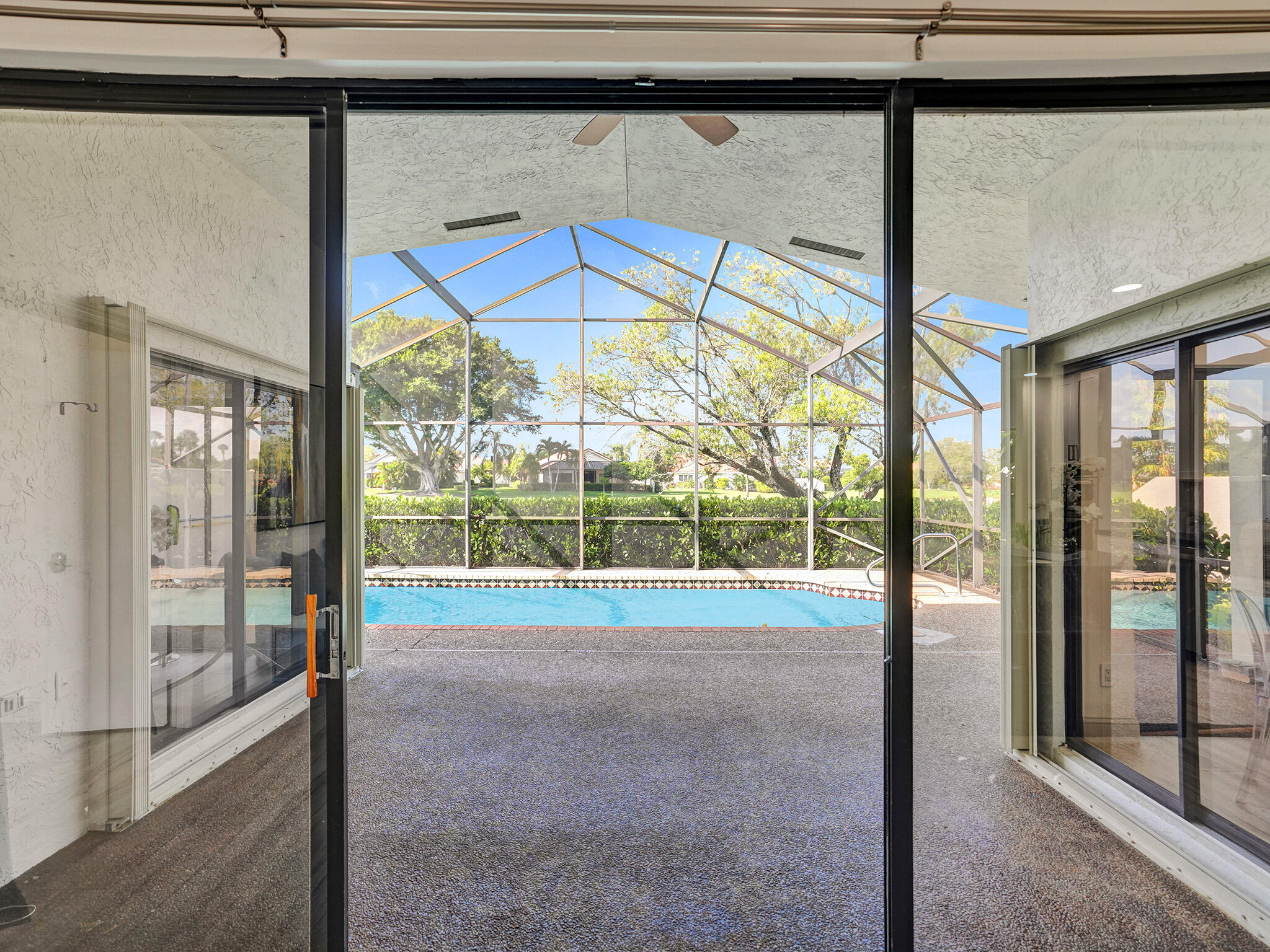 10698 Crystal Lake Drive Boca Raton, FL 33428 - Photo 38 of 48 a view of outdoor space with sliding door