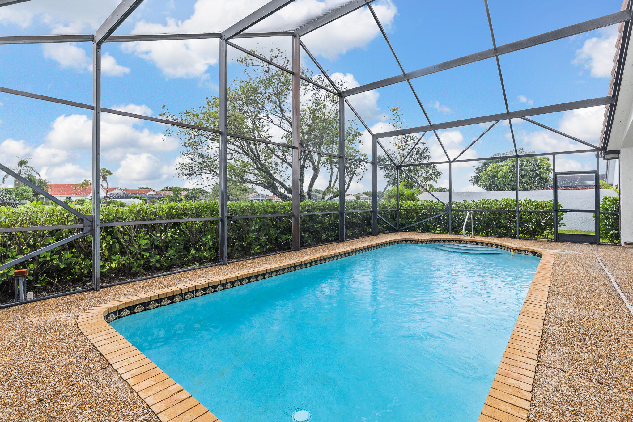 10698 Crystal Lake Drive Boca Raton, FL 33428 - Photo 42 of 48 a view of a backyard