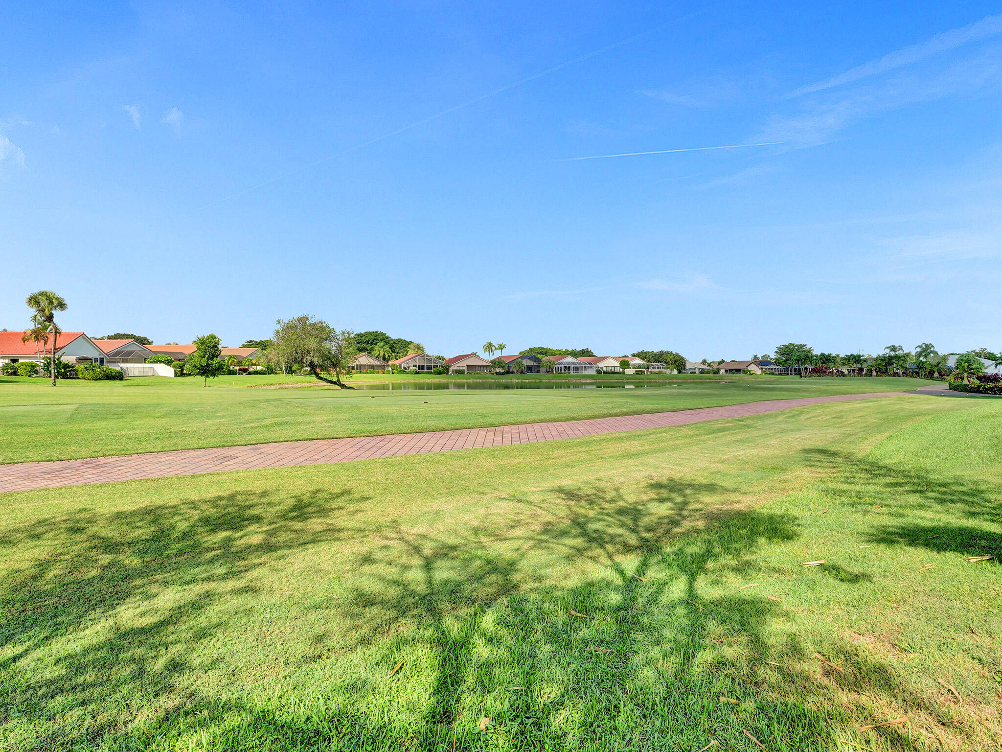 10698 Crystal Lake Drive Boca Raton, FL 33428 - Photo 47 of 48 a view of a lake with a city