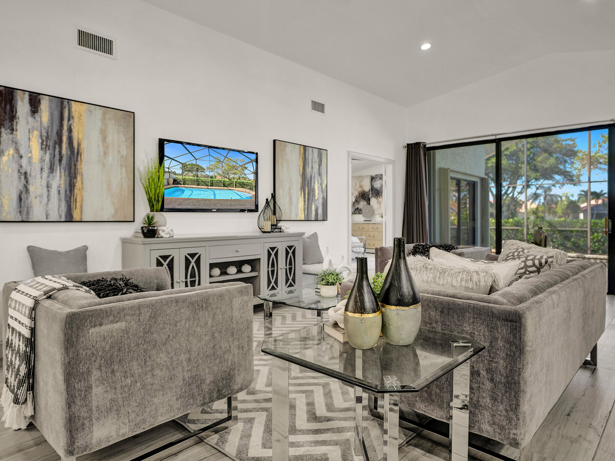 10698 Crystal Lake Drive Boca Raton, FL 33428 - Photo 5 of 48 a living room with fireplace furniture and a flat screen tv