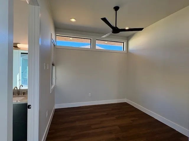 a white bath tub sitting in a bathroom