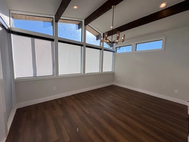 a bathroom with a shower curtain and a sink