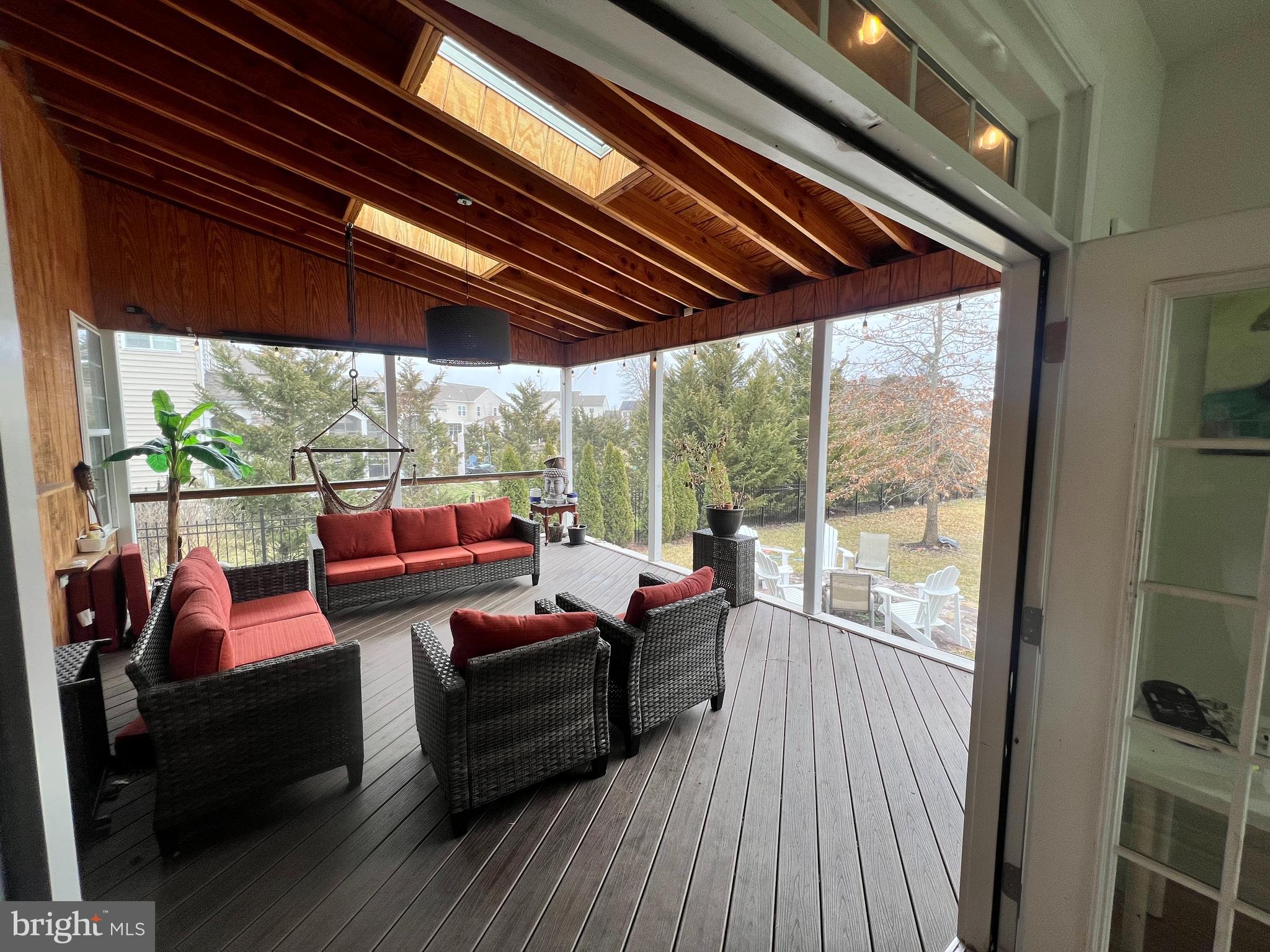 42443 Reservoir Ridge Place Ashburn, VA 20148 - Photo 14 of 22 a bedroom with furniture and a large window