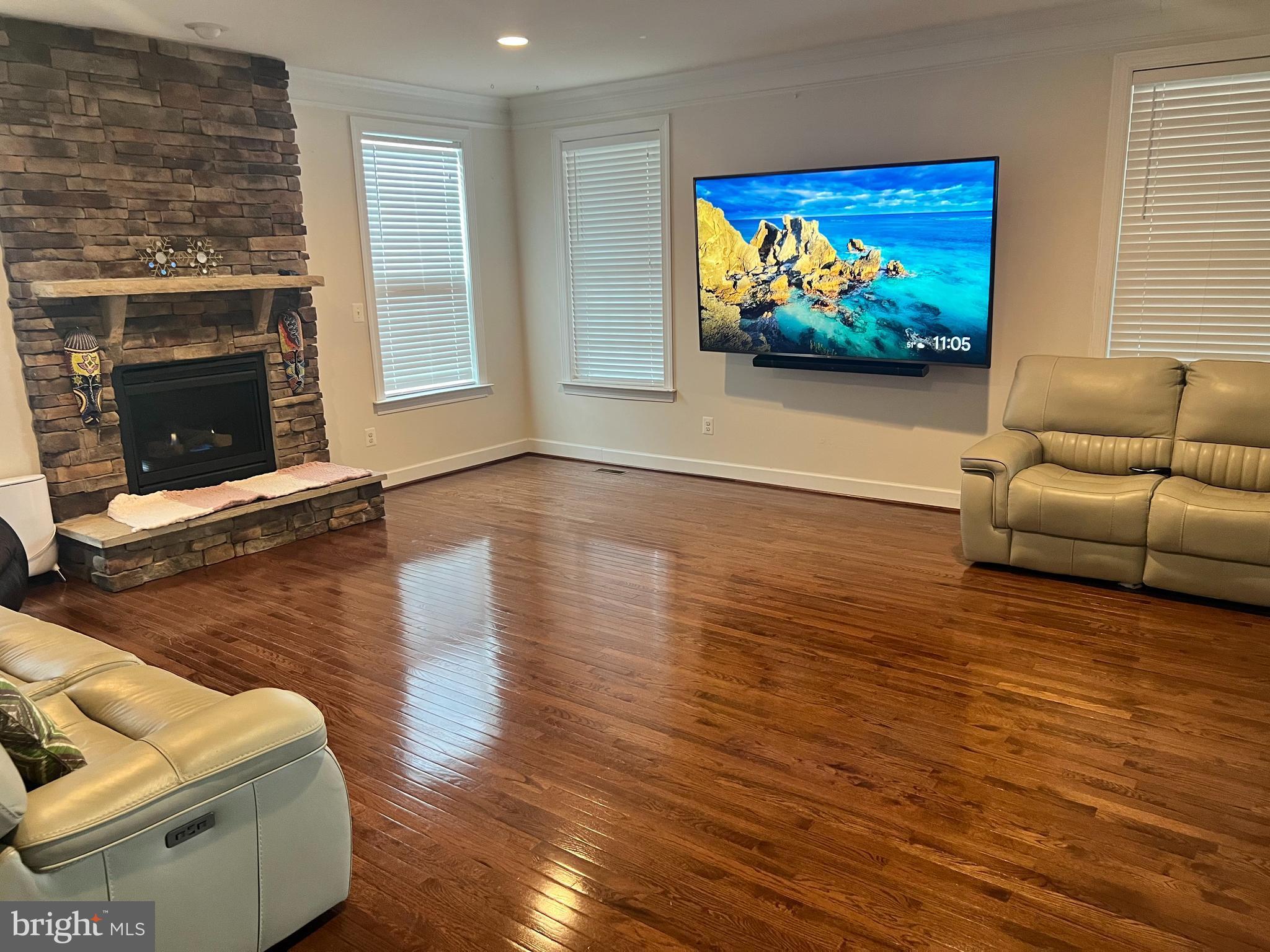 42443 Reservoir Ridge Place Ashburn, VA 20148 - Photo 8 of 22 a view of livingroom with furniture wooden floor and window