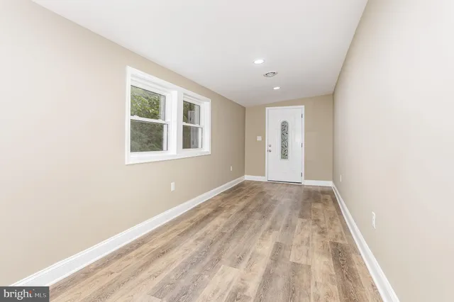 an empty room with windows