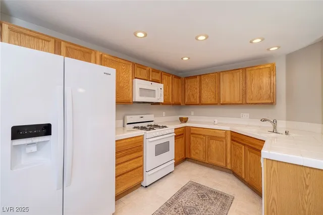 $385,000 | 821 Glacier Peak Lane, Unit 202, Las Vegas, NV 89144