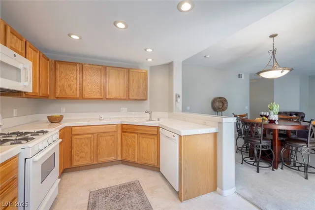 $385,000 | 821 Glacier Peak Lane, Unit 202, Las Vegas, NV 89144