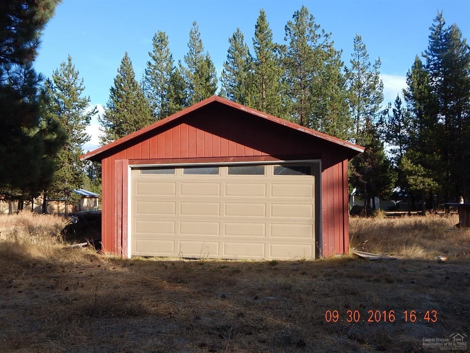 147117 Gracies Road Gilchrist, OR 97737 - Photo 17 of 22 Detached double garage, dirt floor with