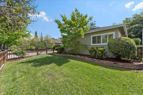 a house view with a garden space