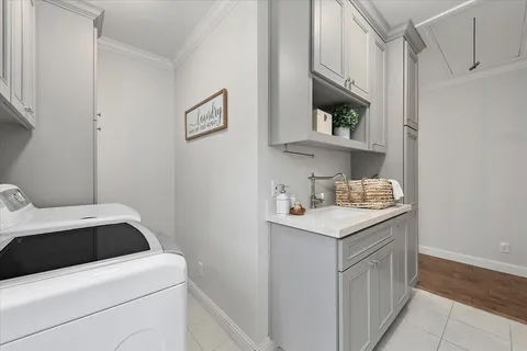 a utility room with washer and dryer