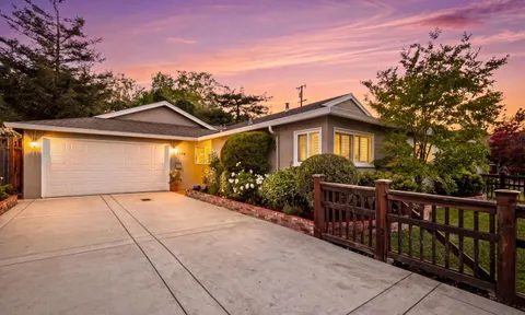 a view of house with outdoor space