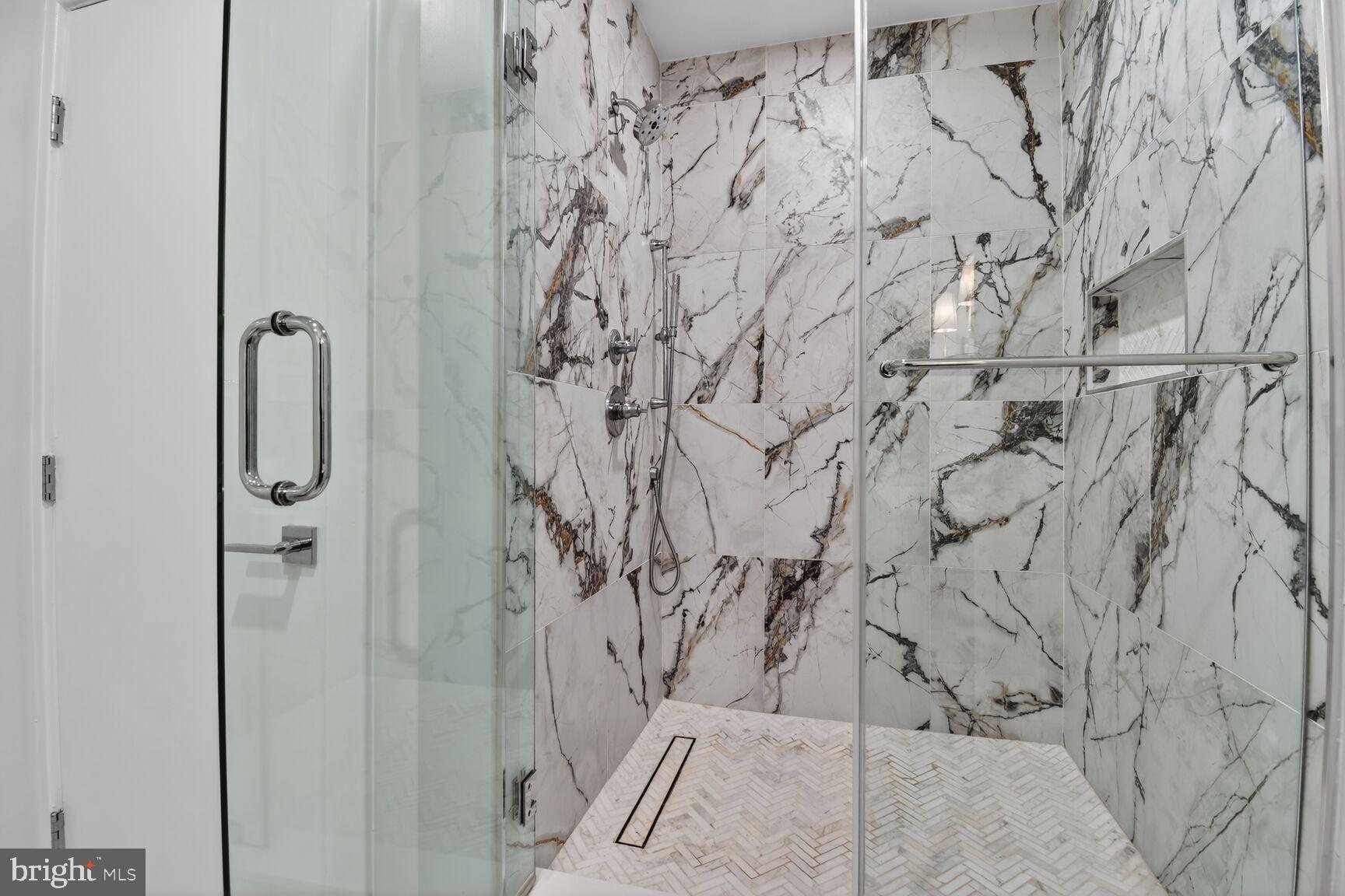 3532 1/2 13th Street Northwest, Unit 2 Washington, DC 20010 - Photo 25 of 38 a bathroom with a bathtub