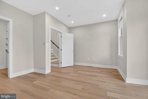 a picture of a bathroom with a shower