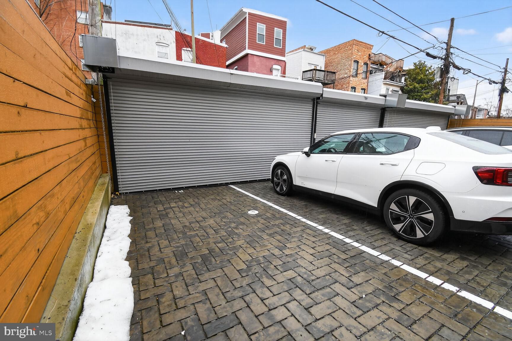 3532 1/2 13th Street Northwest, Unit 2 Washington, DC 20010 - Photo 35 of 38 a car parked in front of a building