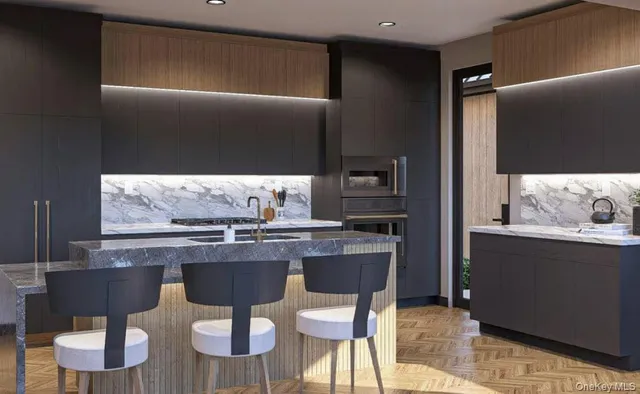 a kitchen with a table and chairs in it