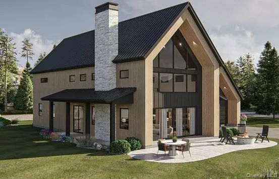 a front view of a house with swimming pool and porch with furniture
