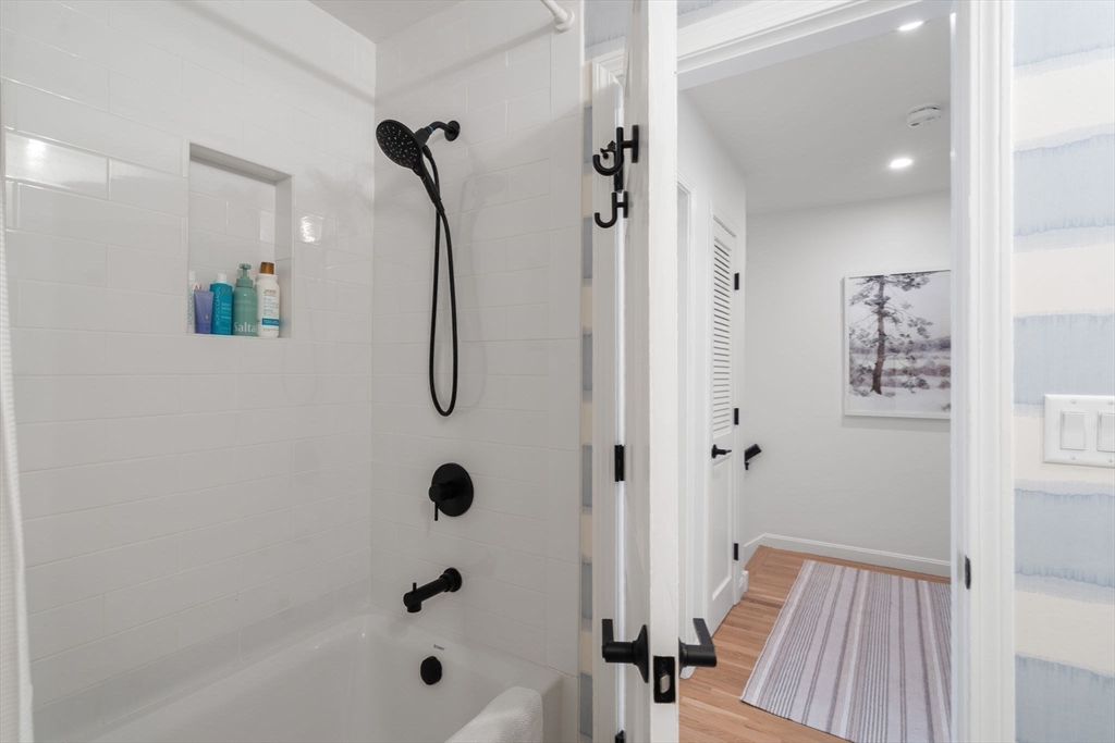 27 R West Street, Unit 13 Beverly, MA 01915 - Photo 22 of 34 a bathroom with a shower