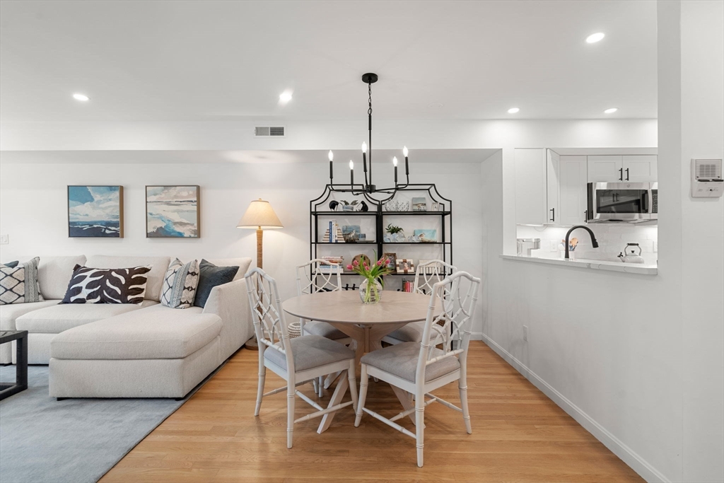 27 R West Street, Unit 13 Beverly, MA 01915 - Photo 7 of 34 a view of a dining room with furniture