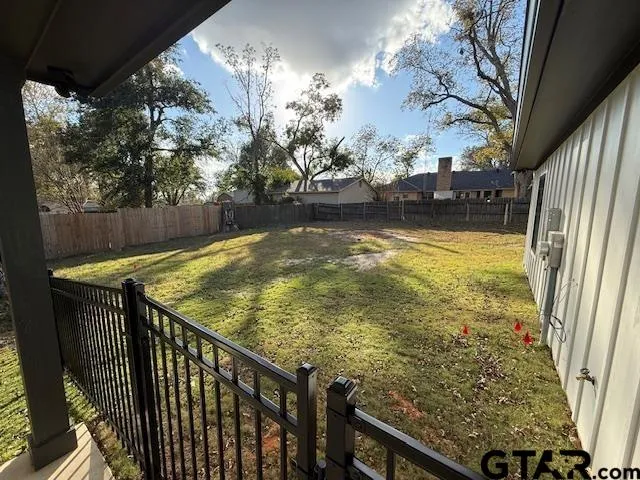 a view of swimming pool from a balcony