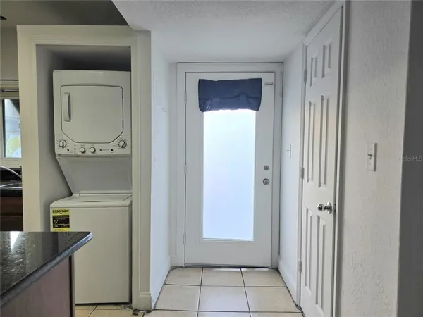 a view of a hallway with entryway