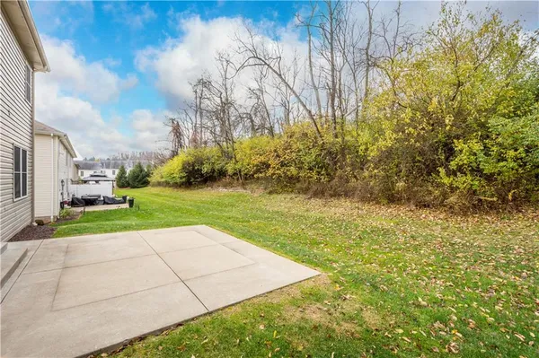 a view of yard with seating area