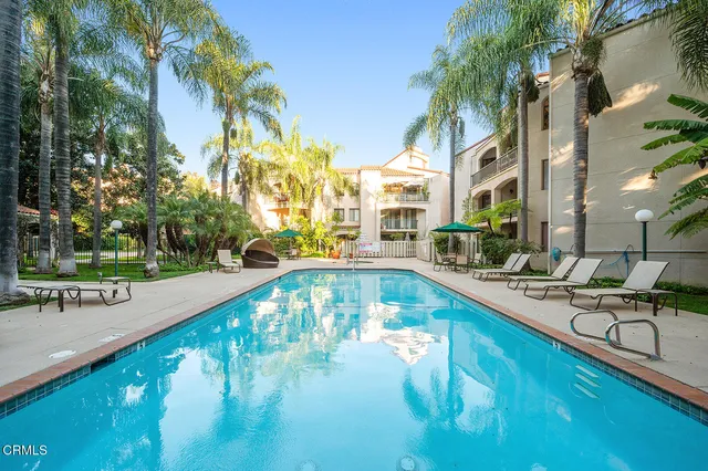 an aerial view of a house with a garden