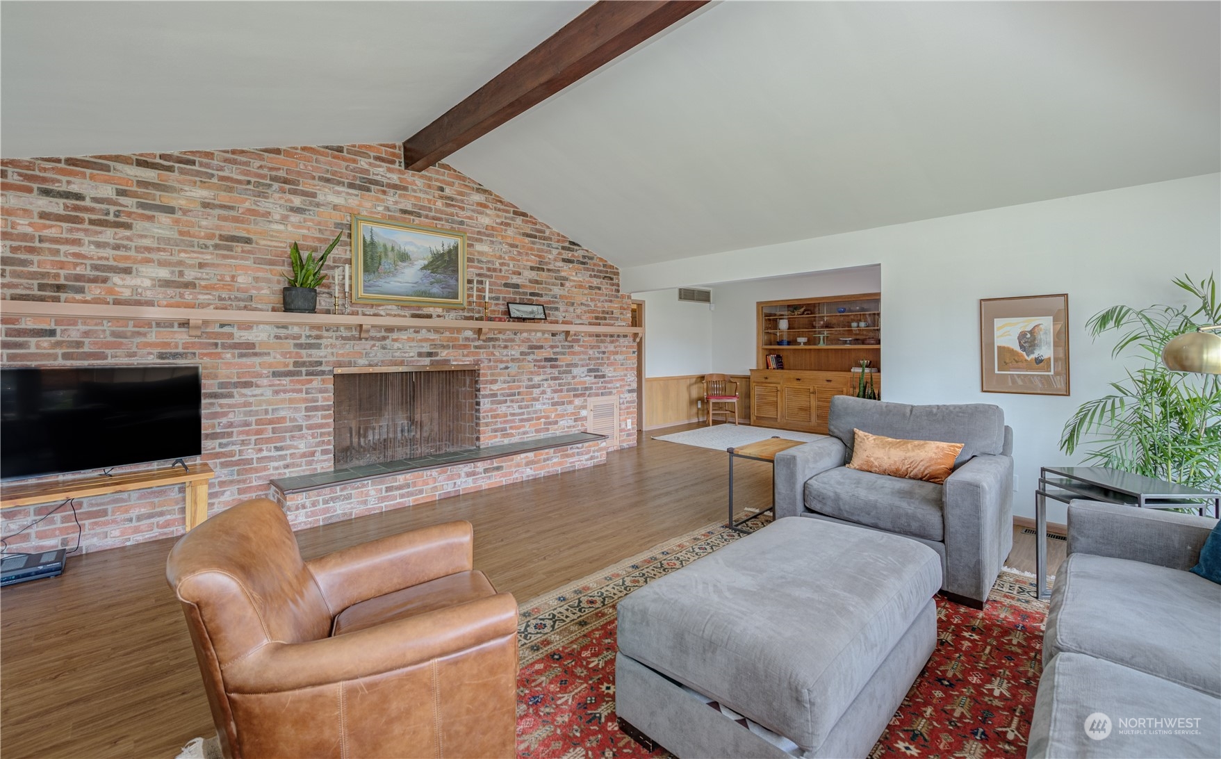 1405 First Street Wenatchee, WA 98801 - Photo 11 of 40 a living room with furniture wooden floor and a fireplace